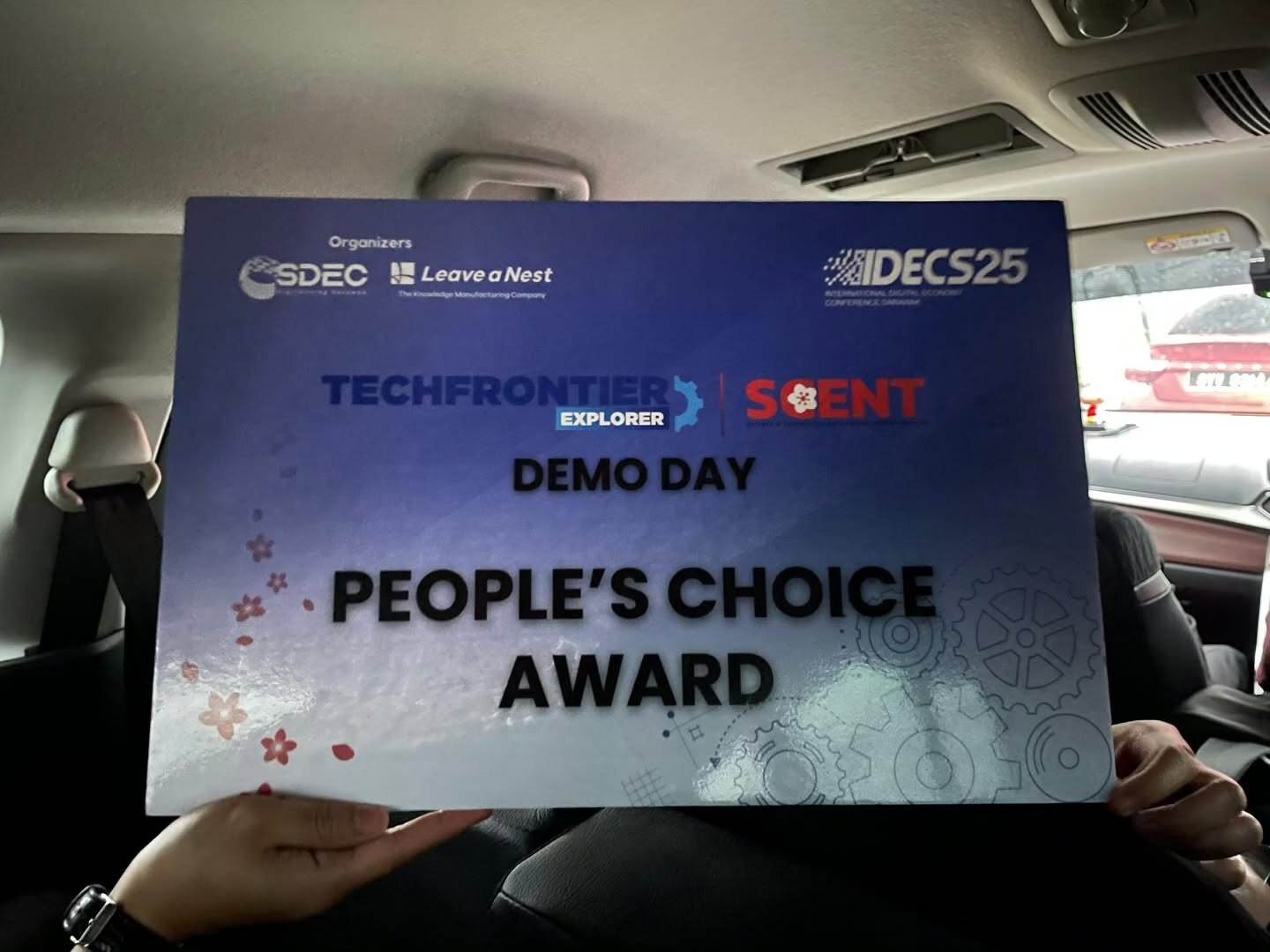 The People's Choice Award card from the TechFrontier Explorer × SCENT Demo Day at IDECS25